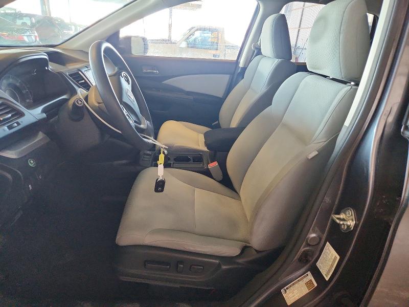 Photo 7 from auction – 2015 HONDA CR-V with VIN 2HKRM3H58FH529558