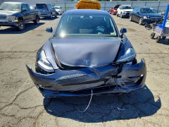 Photo 5 from auction – 2018 TESLA MODEL 3 with VIN 5YJ3E1EA0JF010309