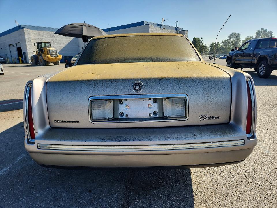 Photo 6 from auction – 1998 CADILLAC DEVILLE with VIN 1G6KD54Y3WU717832