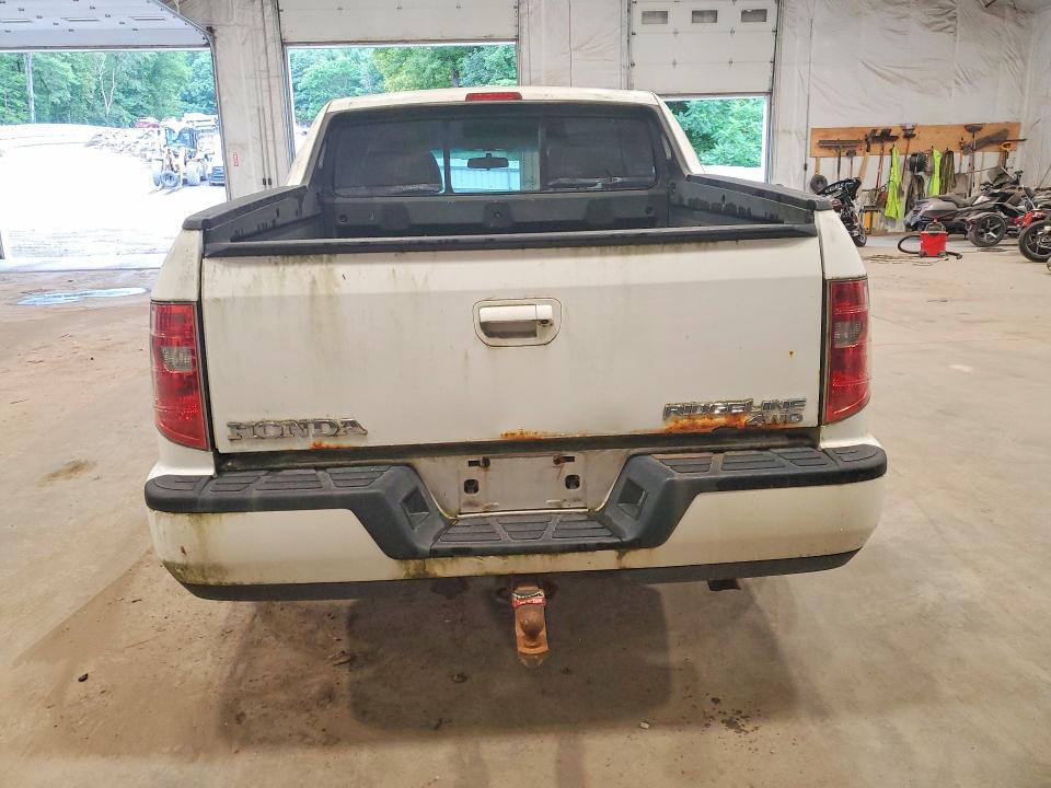 Photo 6 from auction – 2010 HONDA RIDGELINE with VIN 5FPYK1F59AB012521