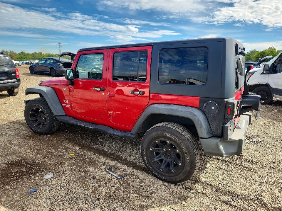 Снимка 2 от търг – 2009 JEEP WRANGLER UNLIMITED с VIN 1J4GA39129L723086