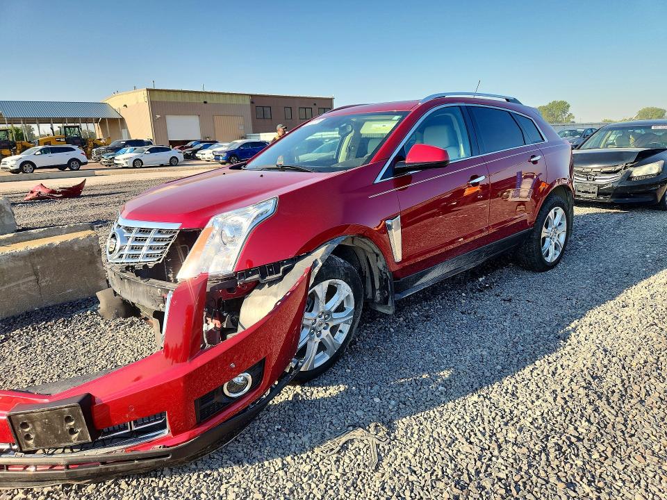 CADILLAC SRX 2015 with VIN 3GYFNFE31FS607019 - Photo from auction