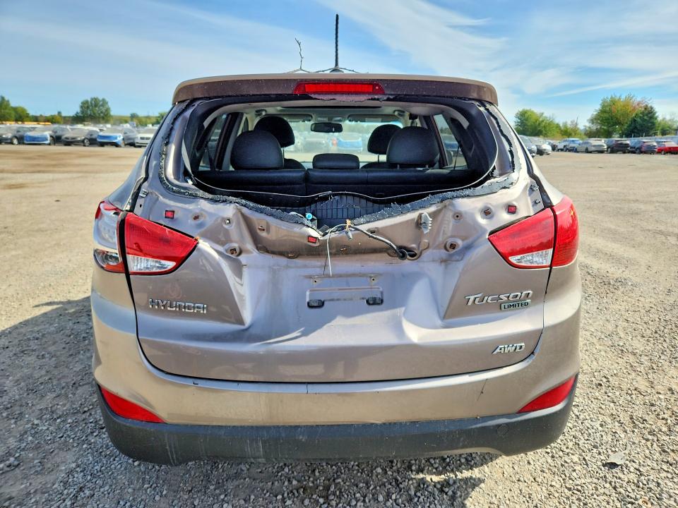 Photo 6 from auction – 2012 HYUNDAI TUCSON with VIN KM8JUCAC6CU474028