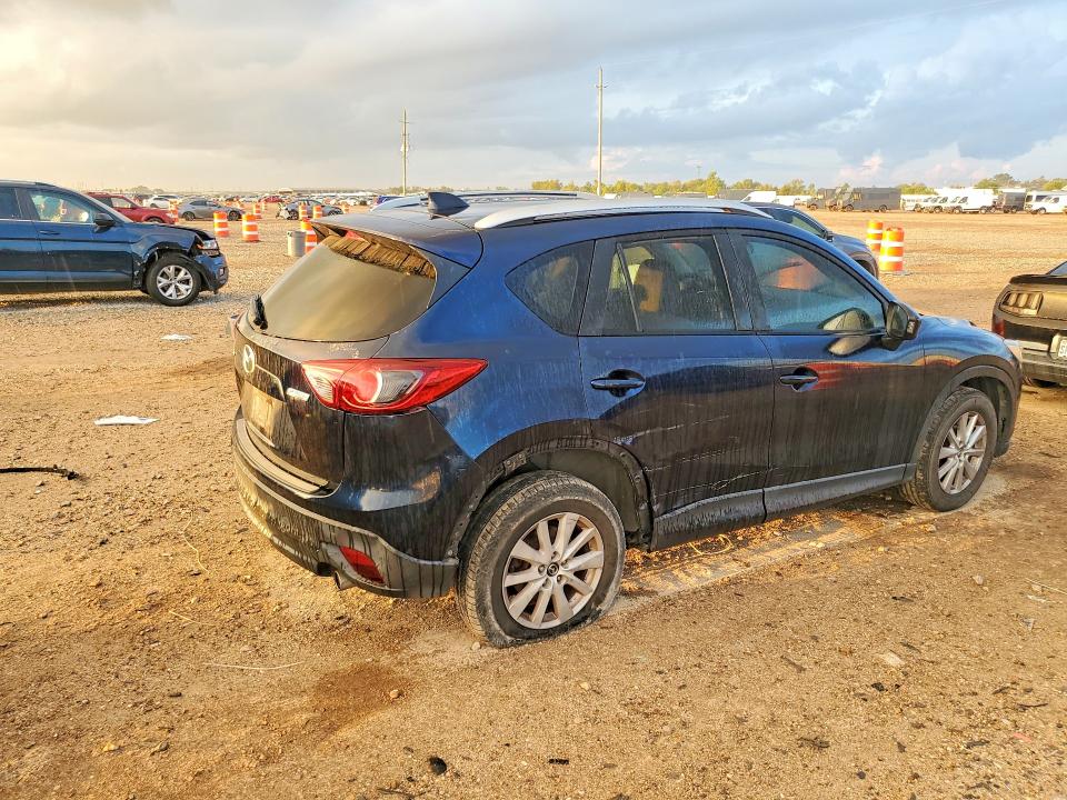 Photo 3 from auction – 2014 MAZDA CX-5 with VIN JM3KE2CY0E0409525