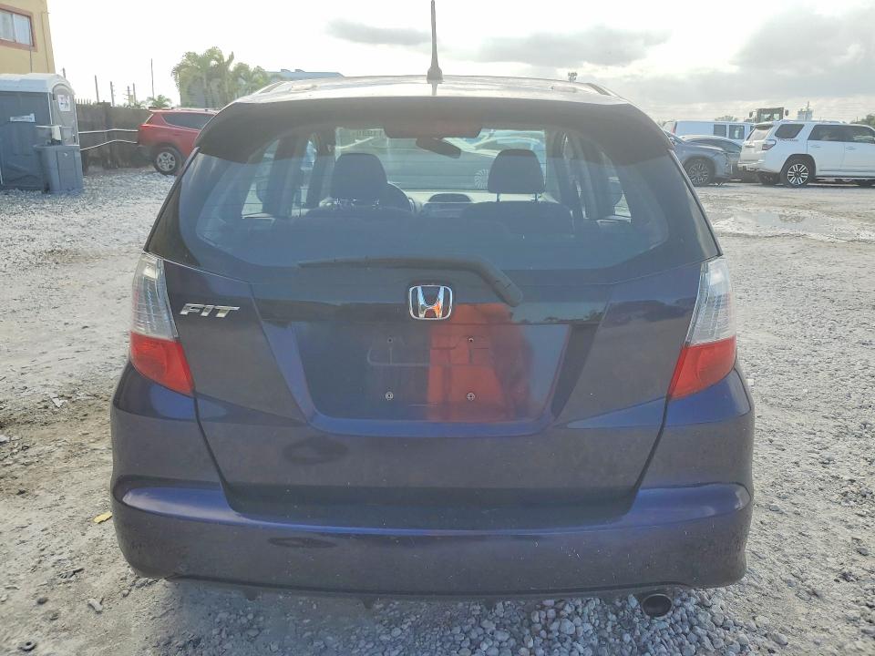 Photo 6 from auction – 2009 HONDA FIT with VIN JHMGE88459S057817