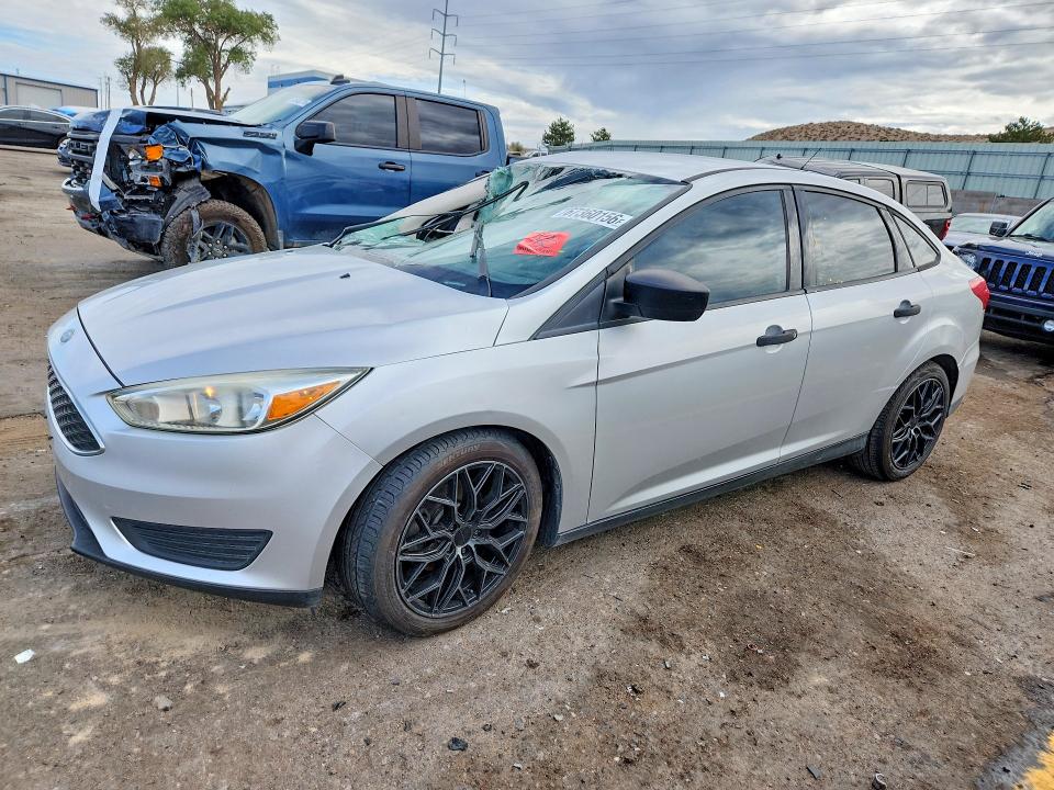 FORD FOCUS 2016 with VIN 1FADP3E2XGL301463 - Photo from auction