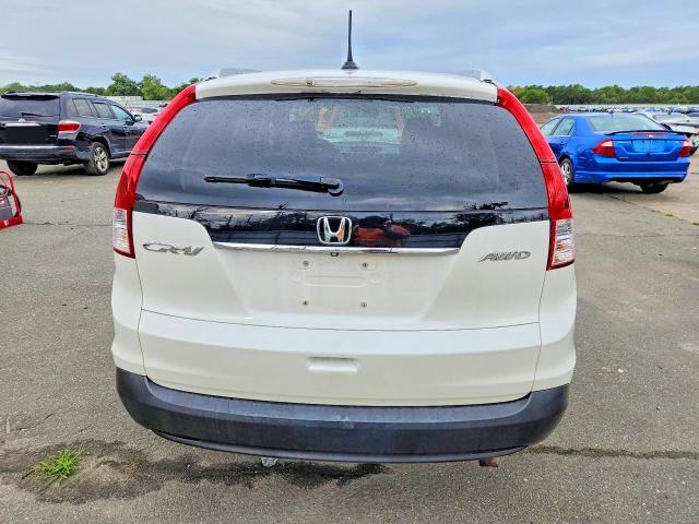Photo 6 from auction – 2014 HONDA CR-V with VIN 5J6RM4H77EL041553