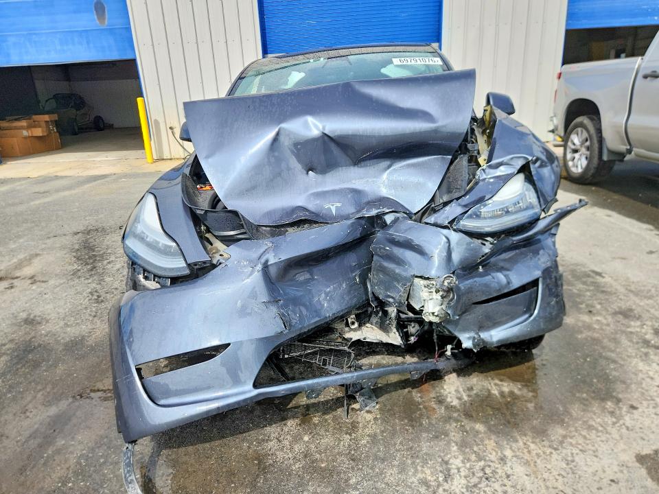 Photo 5 from auction – 2023 TESLA MODEL Y with VIN 7SAYGDEE0PA110102