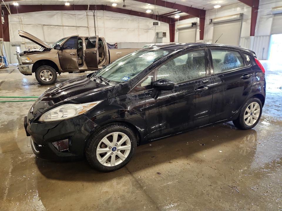 FORD FIESTA 2012 с VIN 3FADP4EJ3CM118184 - Снимка от търг