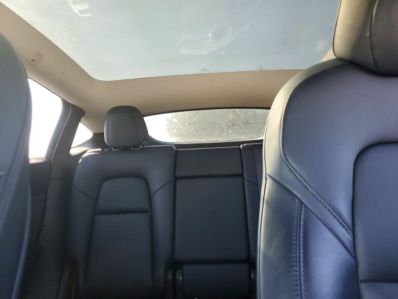 Снимка 10 от търг – 2021 TESLA MODEL Y с VIN 5YJYGDEE4MF073907
