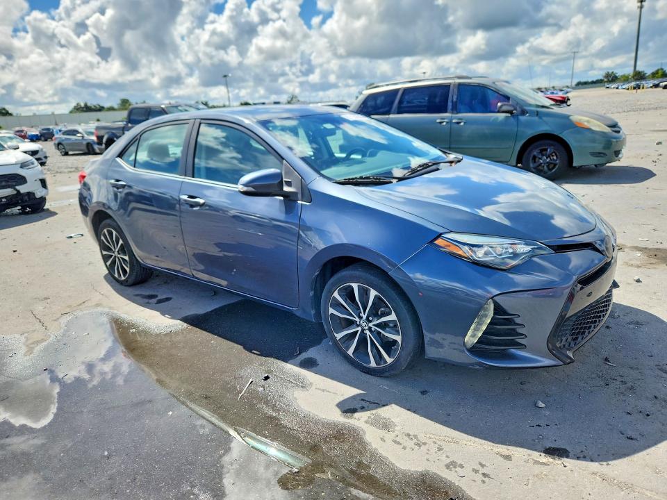 Photo 4 from auction – 2018 TOYOTA COROLLA with VIN 5YFBURHE9JP820828
