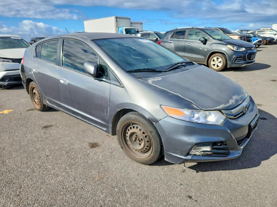 Photo 4 from auction – 2014 HONDA INSIGHT with VIN JHMZE2H37ES001644