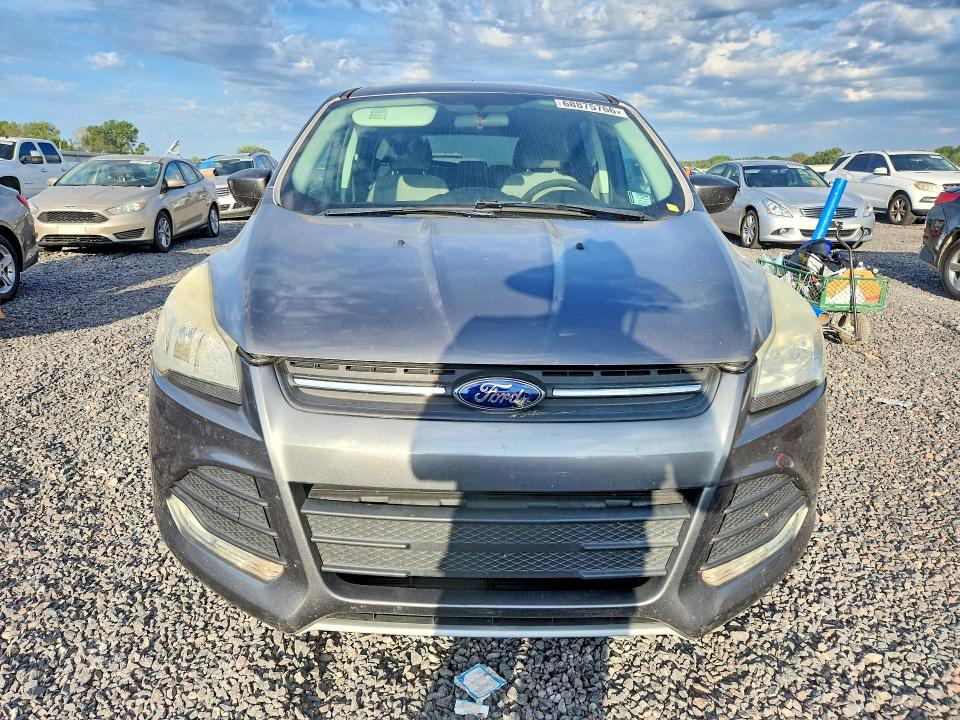 Foto 5 de la subasta – 2014 FORD ESCAPE con VIN 1FMCU0GX4EUD07431