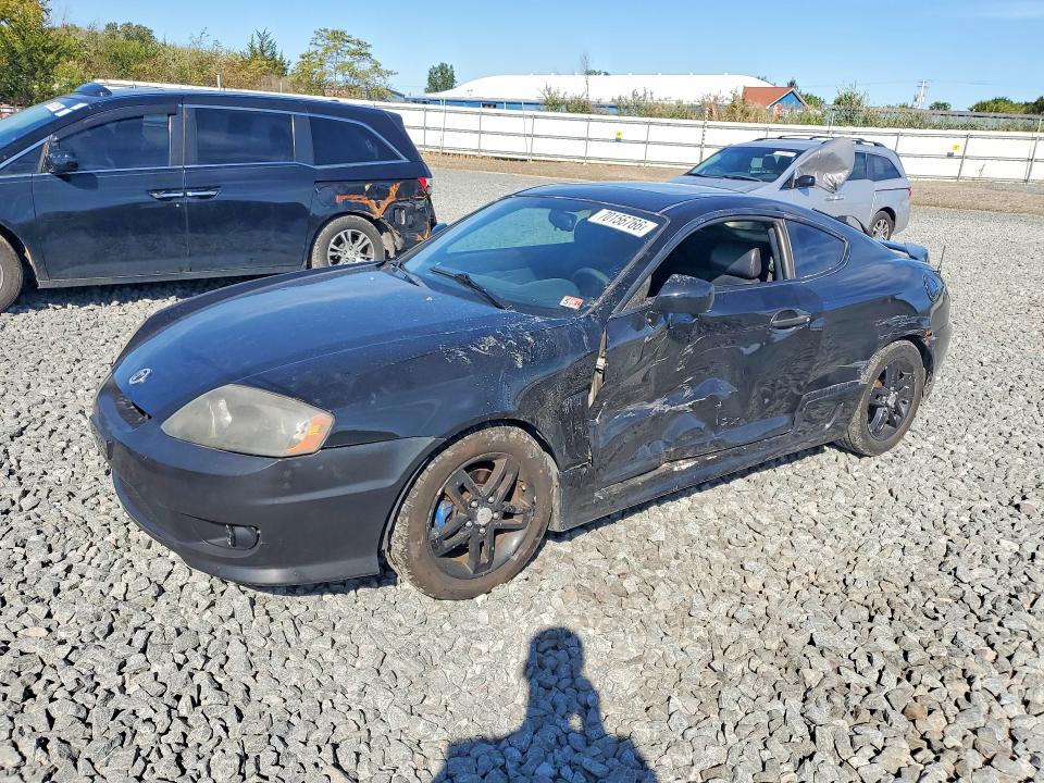Photo 1 from auction – 2003 HYUNDAI TIBURON with VIN KMHHN65F33U018652