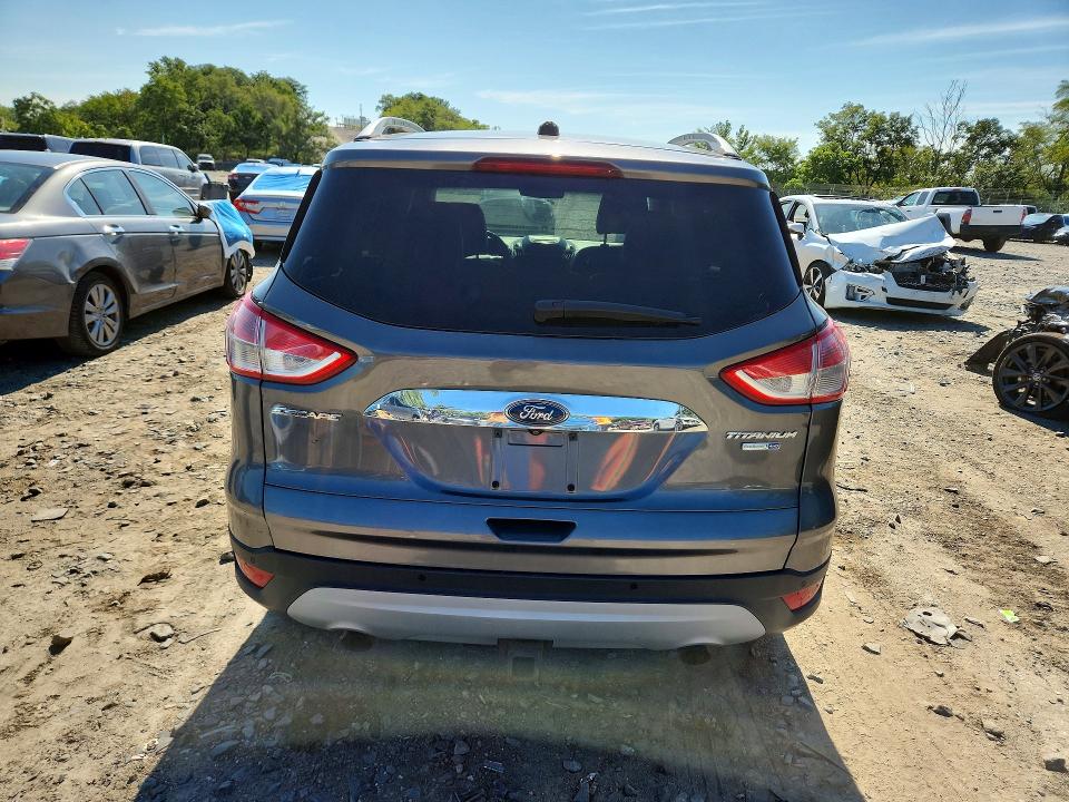 Photo 6 from auction – 2014 FORD ESCAPE with VIN 1FMCU9J93EUA10312