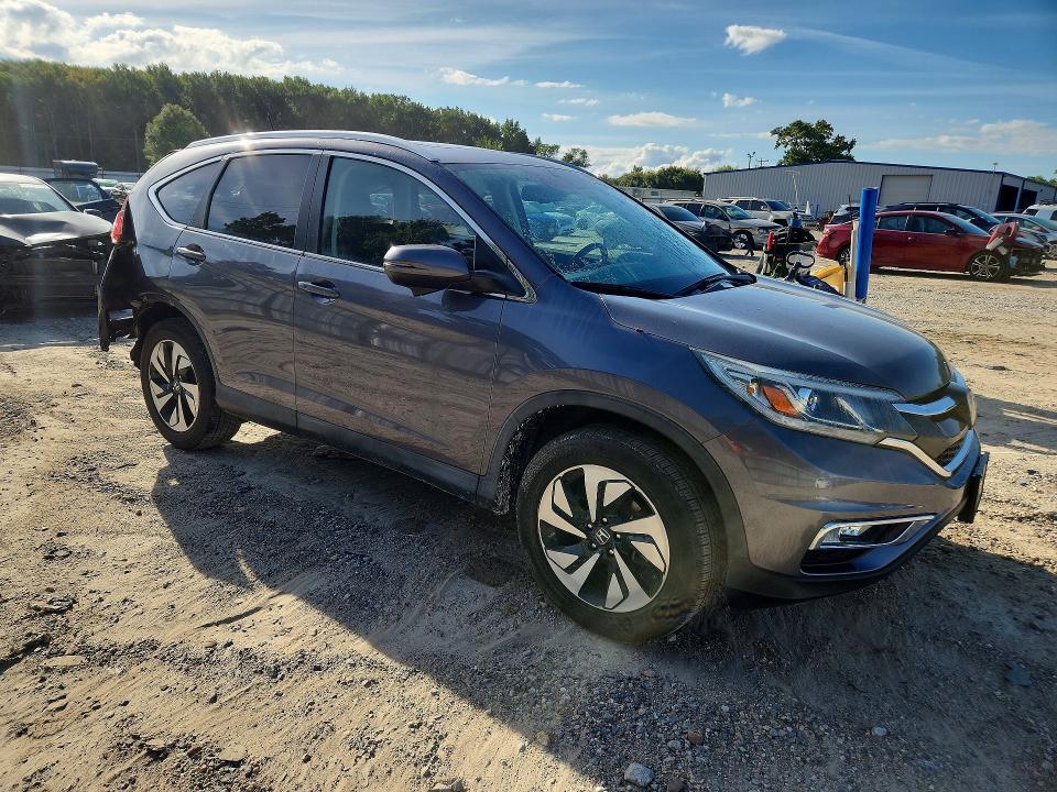 Photo 4 from auction – 2016 HONDA CR-V with VIN 5J6RM3H93GL000724