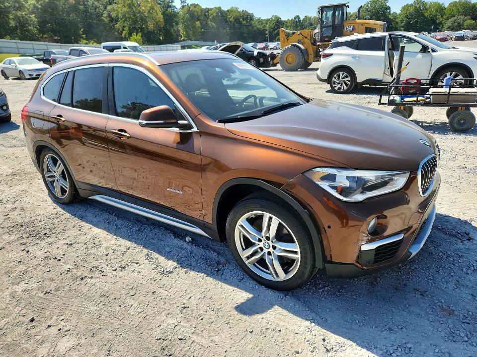 Foto 4 de la subasta – 2016 BMW X1 con VIN WBXHT3C34GP880416