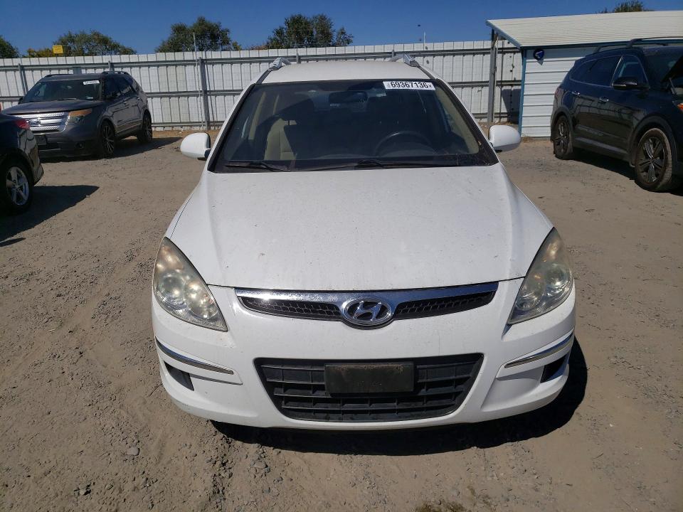 Photo 5 from auction – 2011 HYUNDAI ELANTRA TOURING with VIN KMHDC8AEXBU102298