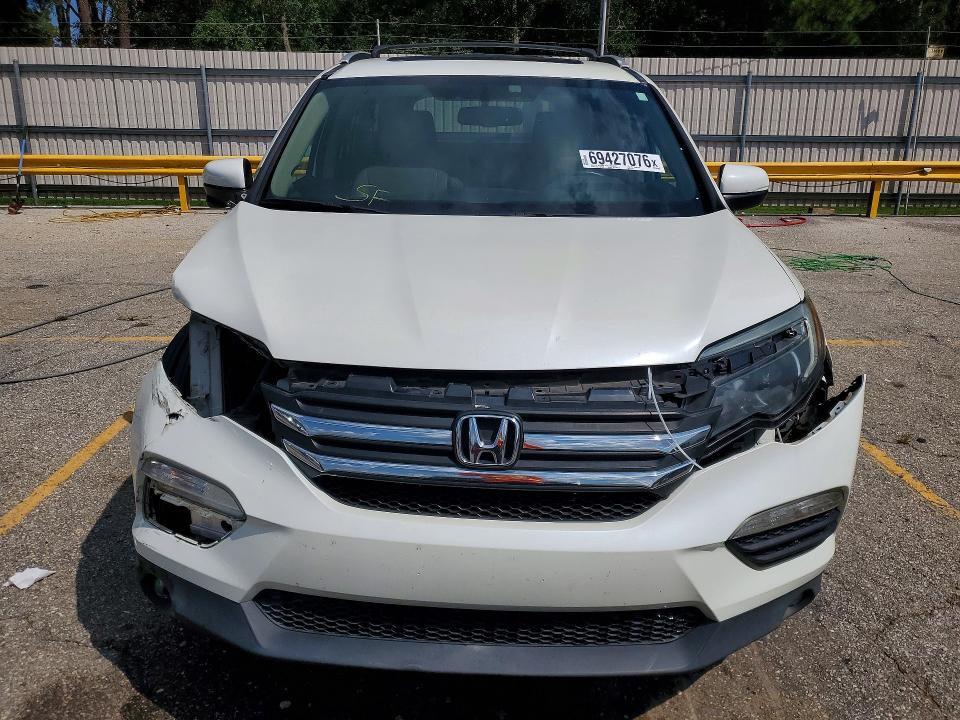 Снимка 5 от търг – 2016 HONDA PILOT с VIN 5FNYF5H53GB013237