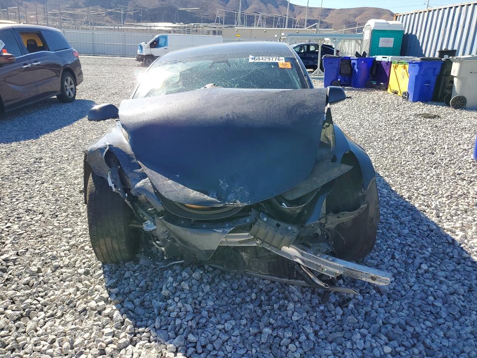 Снимка 5 от търг – 2021 TESLA MODEL 3 с VIN 5YJ3E1EA4MF045441