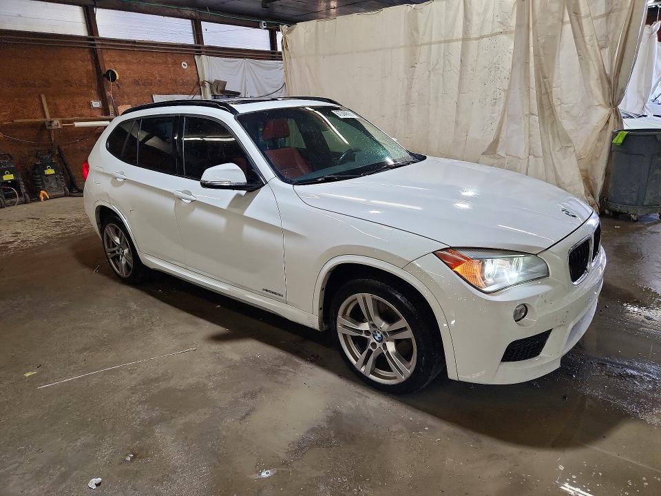 Photo 4 from auction – 2015 BMW X1 with VIN WBAVL1C5XFVY35493