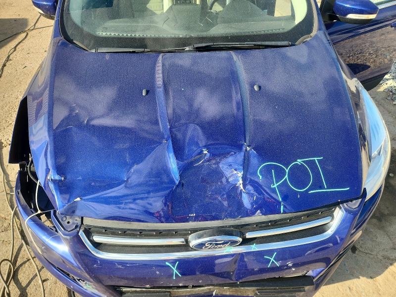 Foto 12 de la subasta – 2016 FORD ESCAPE con VIN 1FMCU0JX8GUB29809