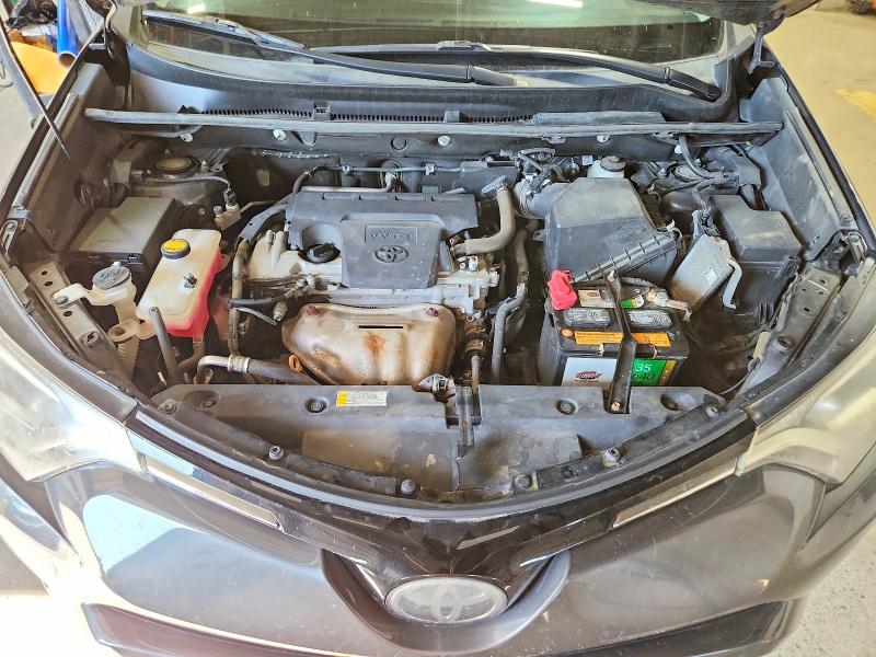 Photo 12 from auction – 2018 TOYOTA RAV4 with VIN 2T3RFREV7JW781918