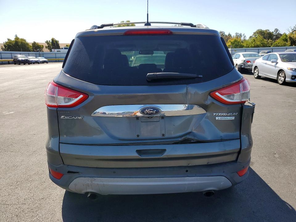 Снимка 6 от търг – 2014 FORD ESCAPE с VIN 1FMCU0JX5EUB49657