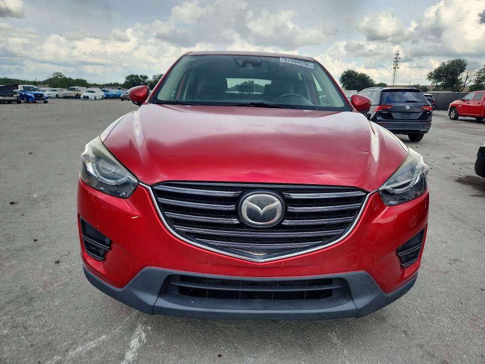 Photo 5 from auction – 2016 MAZDA CX-5 with VIN JM3KE2DY7G0841109