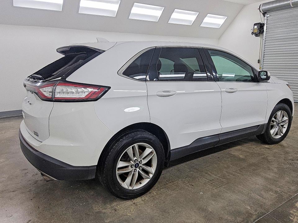 Photo 3 from auction – 2016 FORD EDGE with VIN 2FMPK4J95GBB59324