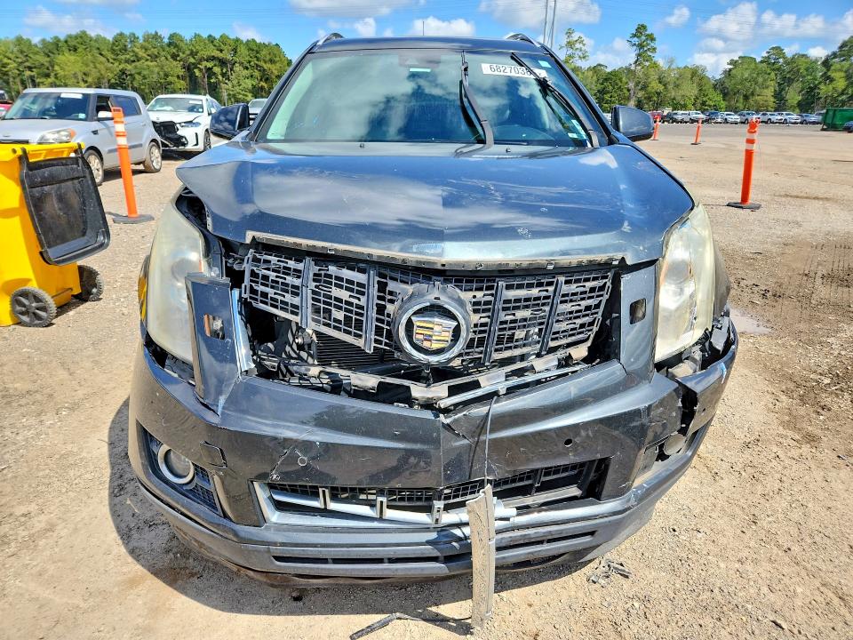 Zdjęcie 5 z aukcji – 2014 CADILLAC SRX z VIN 3GYFNDE38ES659136