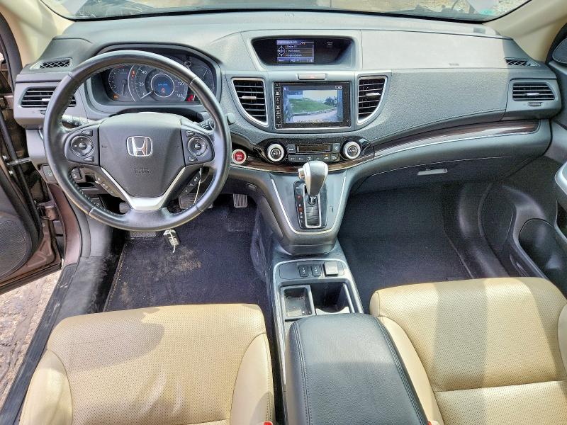 Photo 8 from auction – 2016 HONDA CR-V with VIN 5J6RM4H97GL039399