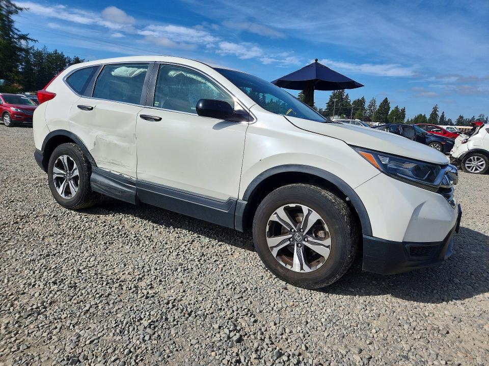 Photo 4 from auction – 2017 HONDA CR-V with VIN 2HKRW6H35HH211295