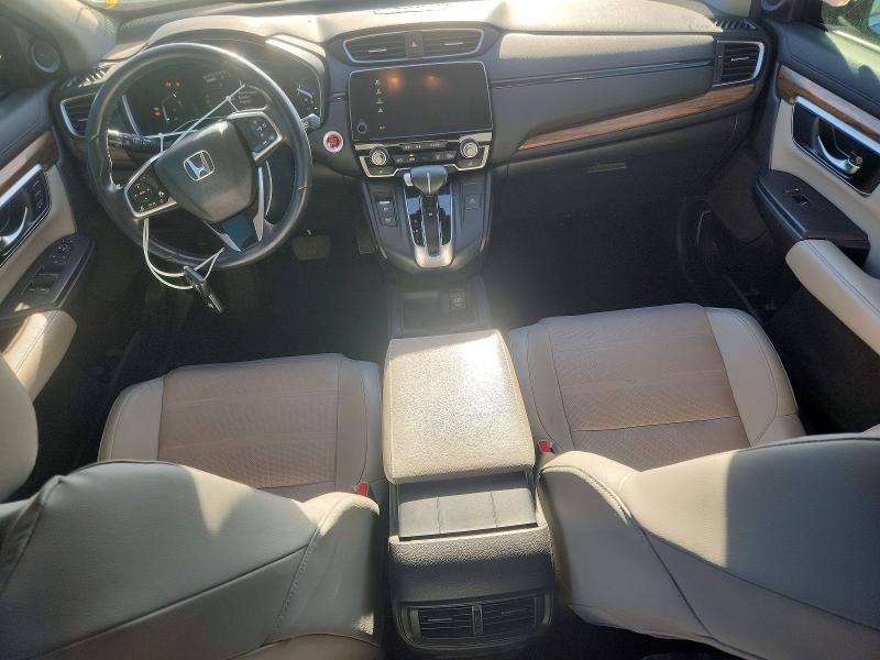 Photo 8 from auction – 2017 HONDA CR-V with VIN 7FARW1H83HE018581