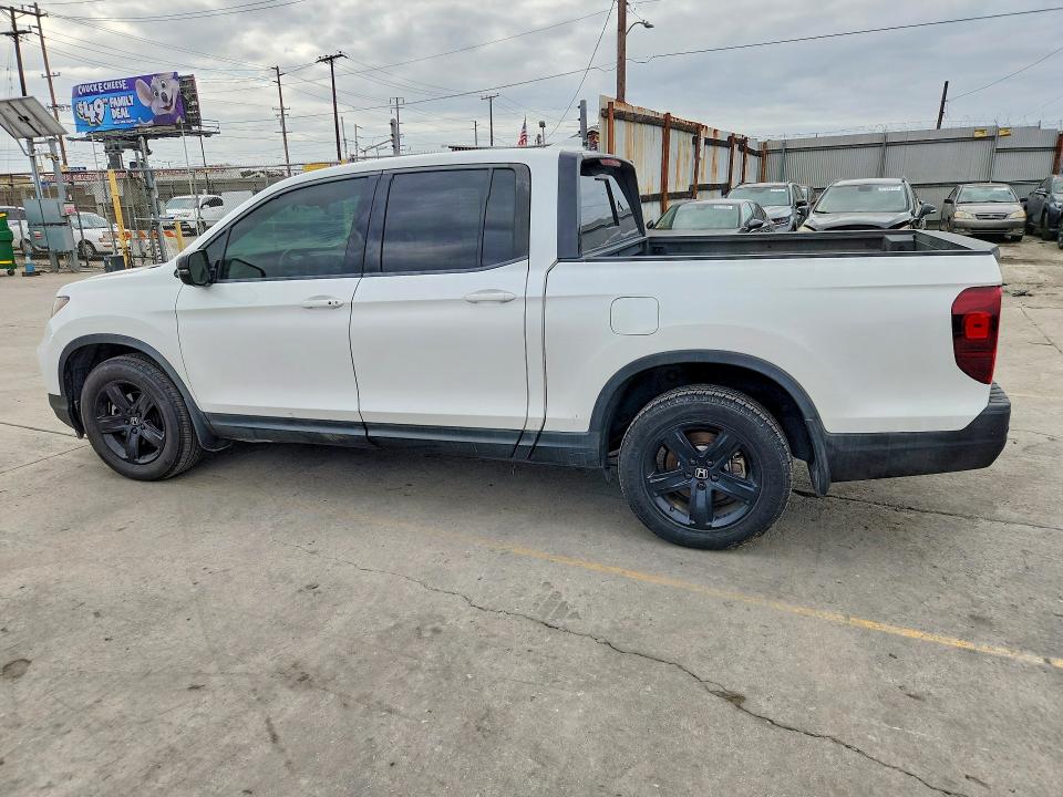 Photo 2 from auction – 2021 HONDA RIDGELINE with VIN 5FPYK3F82MB018400