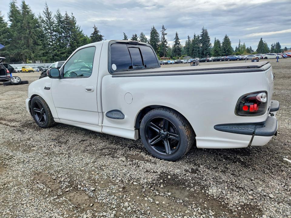 Photo 2 from auction – 2003 FORD F150 with VIN 2FTRF07353CA82925