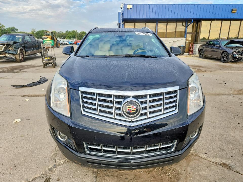 Photo 5 from auction – 2015 CADILLAC SRX with VIN 3GYFNGE37FS571858