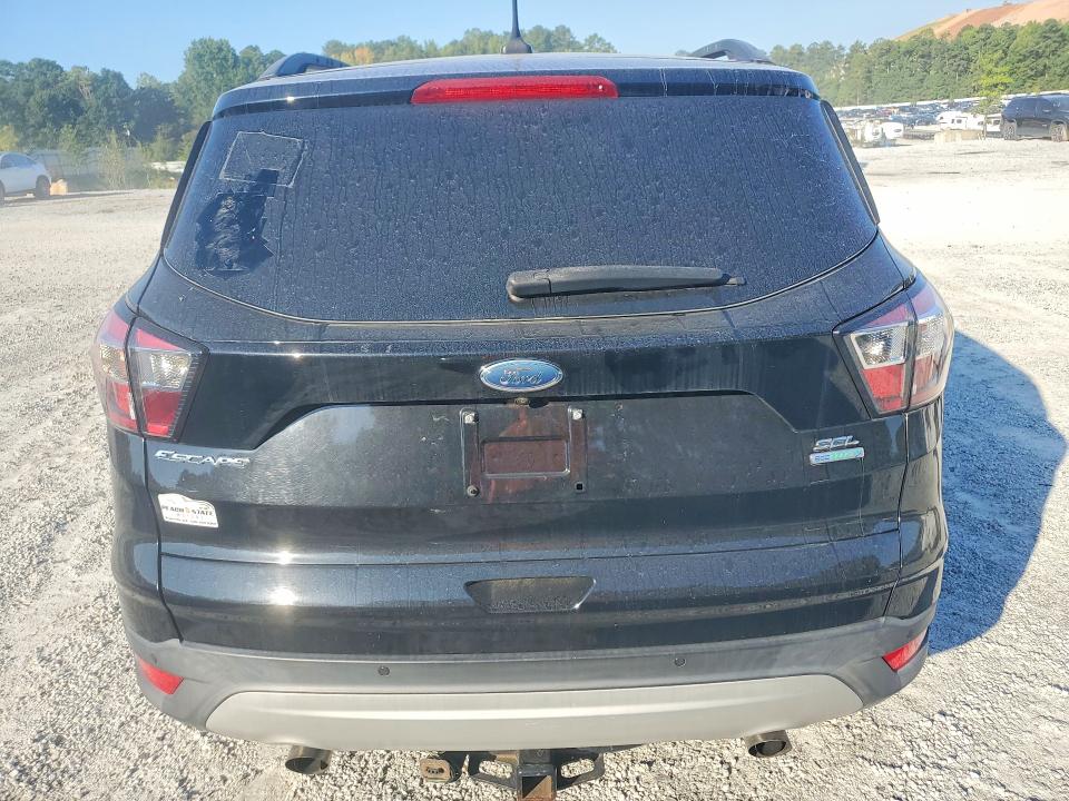 Photo 6 from auction – 2018 FORD ESCAPE with VIN 1FMCU0HDXJUA17323