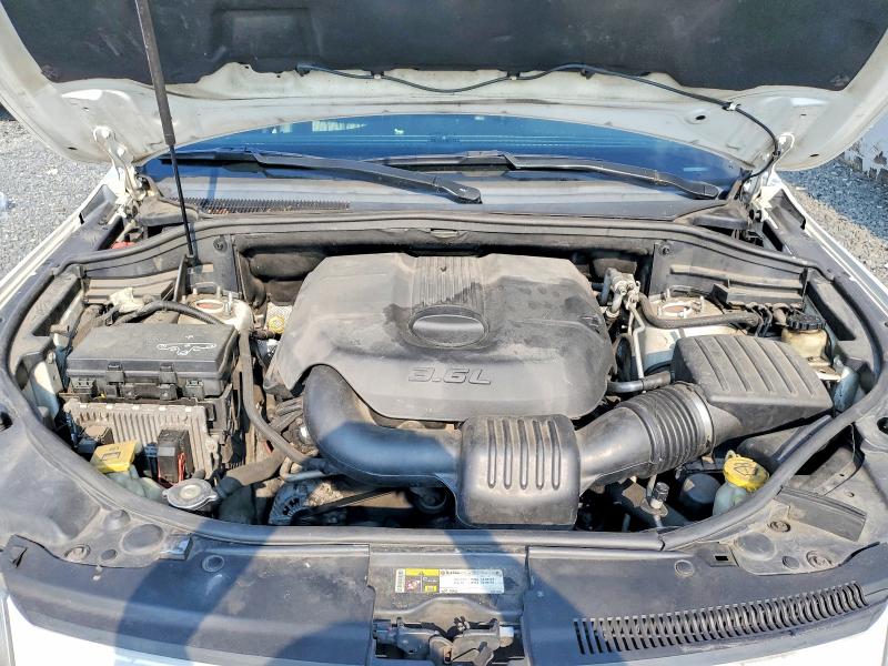 Photo 12 from auction – 2014 JEEP GRAND CHEROKEE with VIN 1C4RJFBG7EC210649