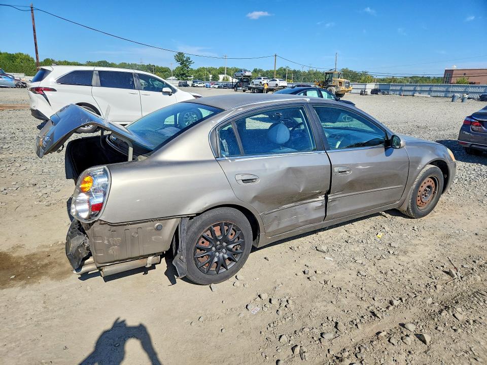 Photo 3 from auction – 2003 NISSAN ALTIMA with VIN 1N4AL11D93C294669