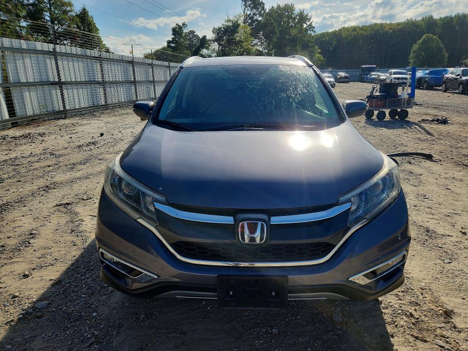 Photo 5 from auction – 2016 HONDA CR-V with VIN 5J6RM3H93GL000724