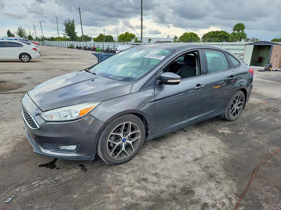 FORD FOCUS 2018 с VIN 1FADP3H2XJL318668 - Снимка от търг