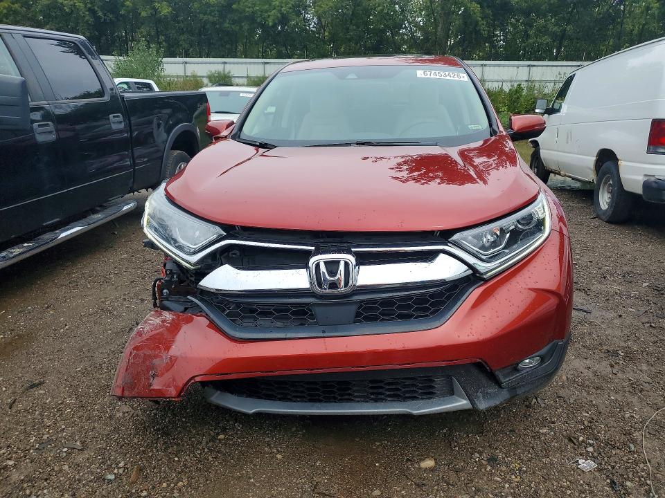 Photo 5 from auction – 2017 HONDA CR-V with VIN 5J6RW2H50HL035112