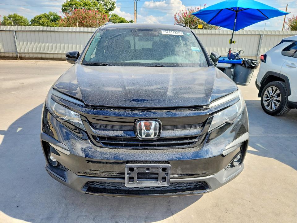 Photo 5 from auction – 2022 HONDA PILOT with VIN 5FNYF5H33NB038229