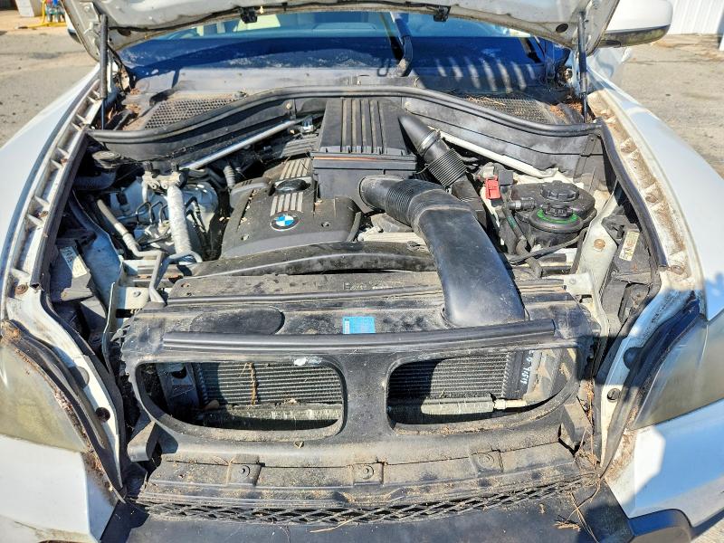 Photo 12 from auction – 2007 BMW X5 with VIN 5UXFE43567L015474