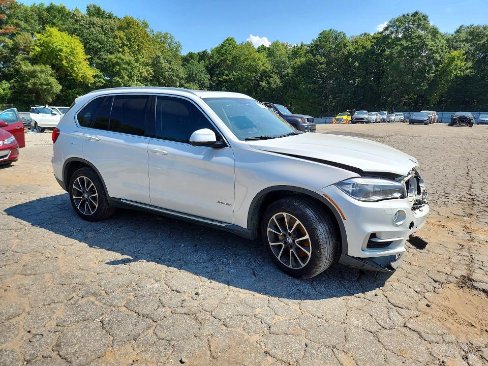 Foto 4 de la subasta – 2016 BMW X5 con VIN 5UXKR6C55G0J81453