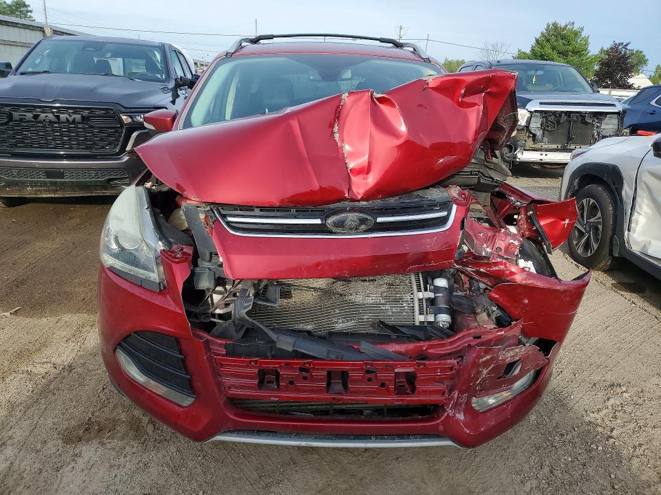 Photo 5 from auction – 2016 FORD ESCAPE with VIN 1FMCU9J93GUA78516