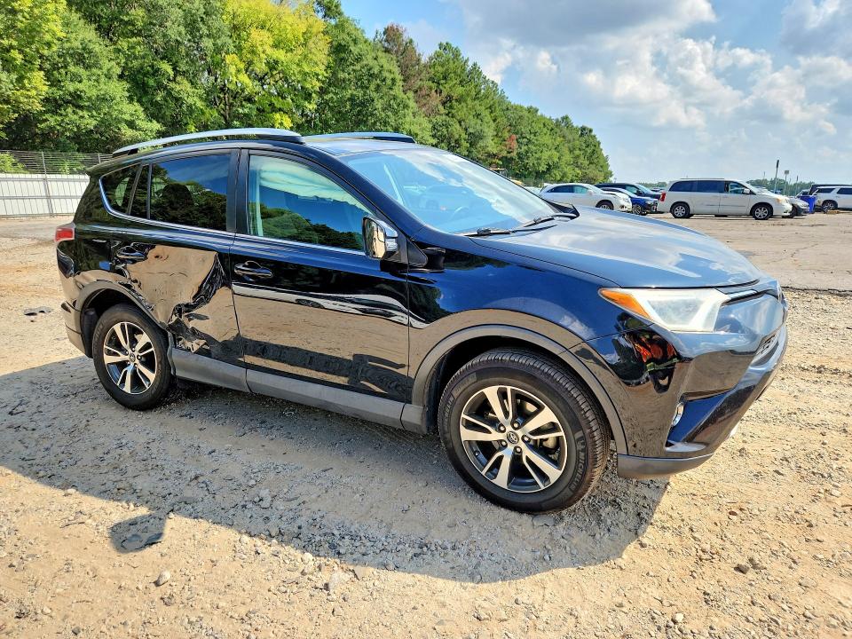Photo 4 from auction – 2016 TOYOTA RAV4 with VIN 2T3WFREV5GW290873