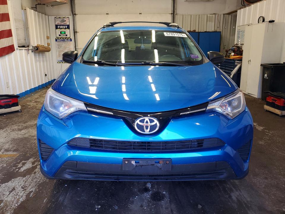 Photo 5 from auction – 2016 TOYOTA RAV4 with VIN JTMBFREV0GJ099634