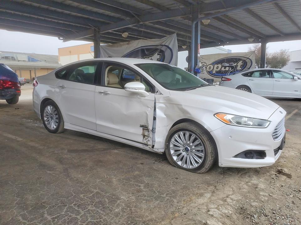 Foto 4 de la subasta – 2014 FORD FUSION con VIN 3FA6P0PU3ER151023